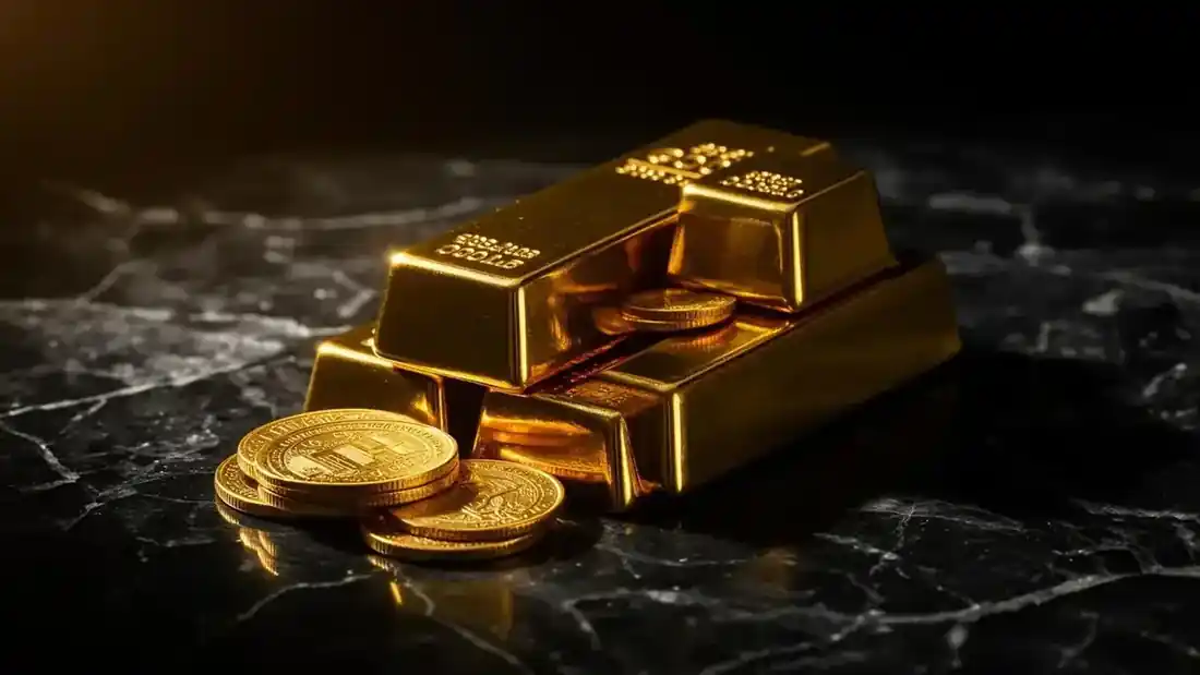 Lingots et pièces d'or sur fond de marbre noir